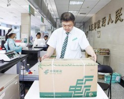 全新綠色標(biāo)準(zhǔn)箱（包裝箱）正式在北京郵政投入使用